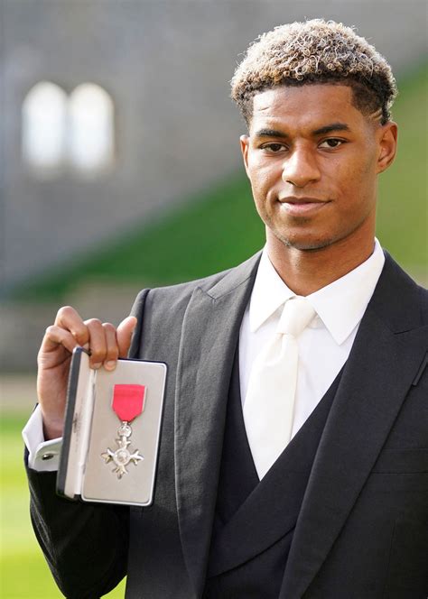 Britain honors footballer Marcus Rashford for fighting child poverty ...