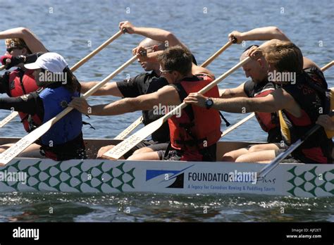 dragon boat team racing Stock Photo - Alamy