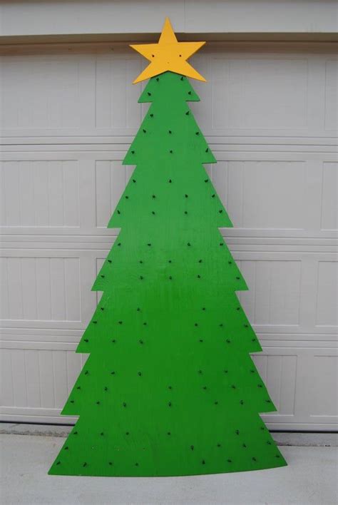 Items similar to Lighted Wooden Christmas Tree on Etsy | Christmas yard art, Wooden christmas ...