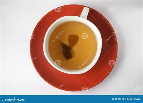 Two Tea-leaves in the Cup of Tea Stock Image - Image of saucer, chinese: 4626941