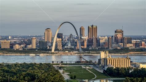 A view of the St. Louis Arch and the city skyline at sunrise in Downtown St. Louis, Missouri ...