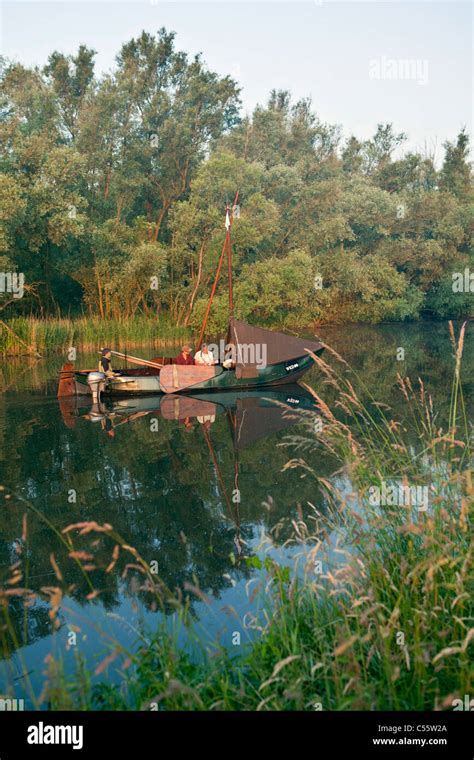 Netherlands, Werkendam, Biesbosch National Park. Fishing scow, called ...