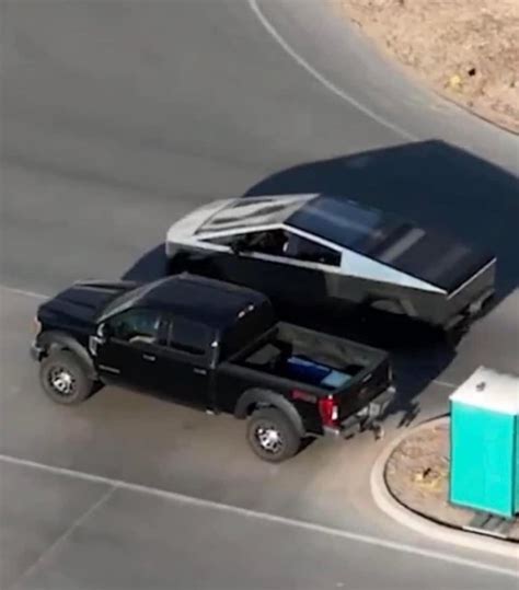 Tesla Cybertruck seen next to Ford F-250 giving size comparison