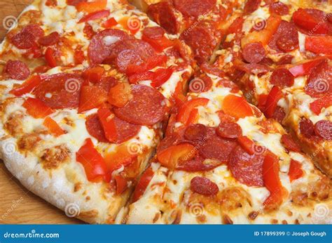 Pepperoni Pizza Sliced stock image. Image of italian - 17899399