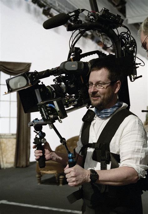 Director Lars von Trier behind the camera on the set of Dogville (2003). | Movie director, Lars ...