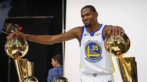 Kevin Durant Holding Mvp Trophy