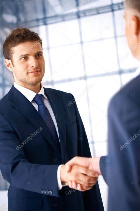 Business shaking hands Stock Photo by ©RomanShyshak 5971750