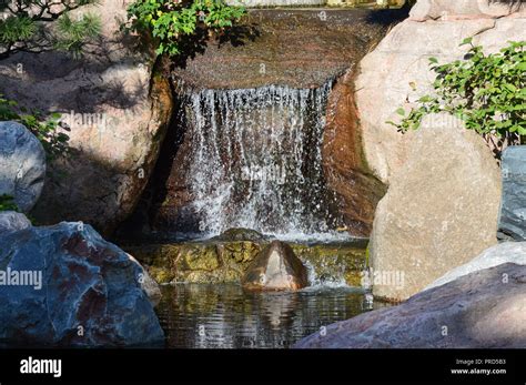 Waterfall in the Japanese garden Stock Photo - Alamy