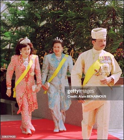 The Sultan of Brunei is pictured with his two wives, Saleha and... News ...