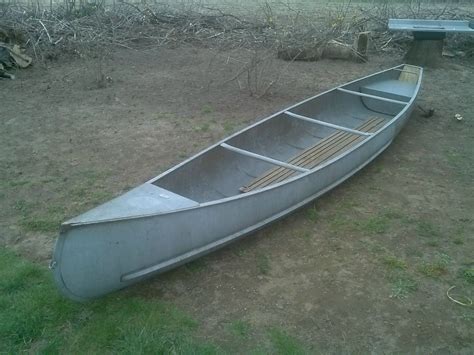 An aluminum canoe, much like the one used in the trip. The canoeing trip with the four men ...