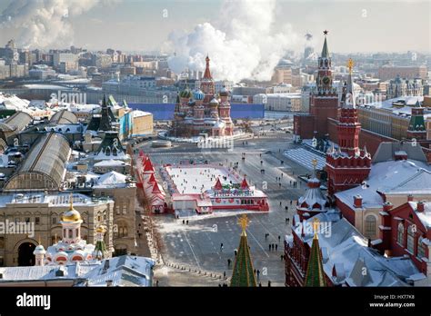 Moscow, Red square and the Kremlin in winter, top view. St. Basil's Cathedral, ice rink and GUM ...