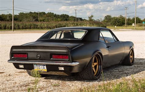 Mysterious Black Matte Chevy Camaro with Carbon Fiber Hood — CARiD.com ...