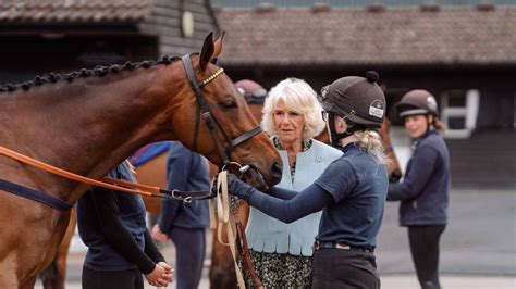 The Queen pays 'wonderful' visit to the British Racing School to mark ...