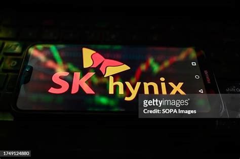 In this photo illustration, SK hynix logo is displayed on a... News ...