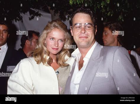 Donna dixon and dan aykroyd hi-res stock photography and images - Alamy