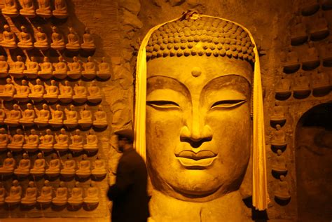 What happened to Buddha's wife and son after his enlightenment?