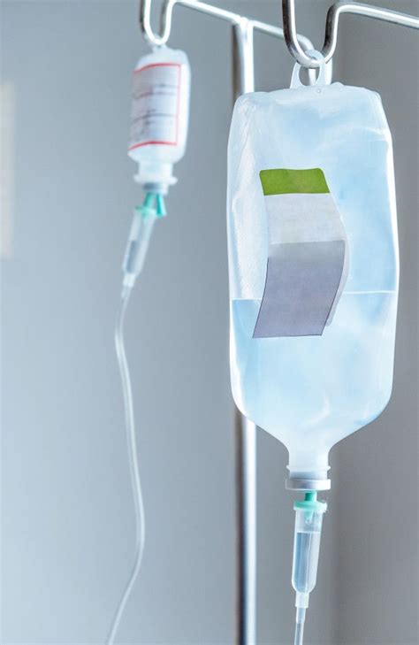 Close Up Of Iv Saline Solution Drip For Patient In Hospital in 2020 ...