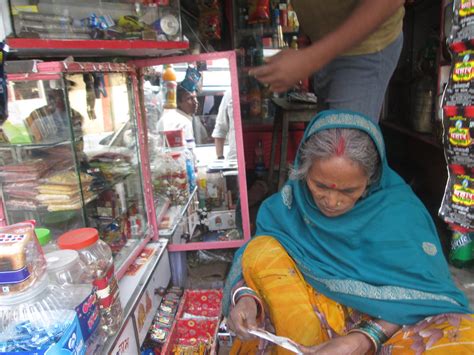 Old Hindu Woman selling | An old Hindu women sat selling ite… | Flickr