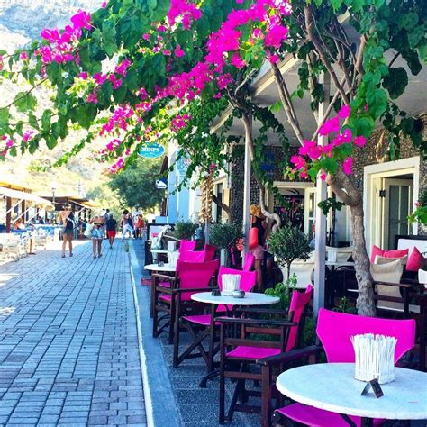 Wandering Kamari Beach Santorini Restaurant © | Santorini restaurants, Kamari beach, Santorini