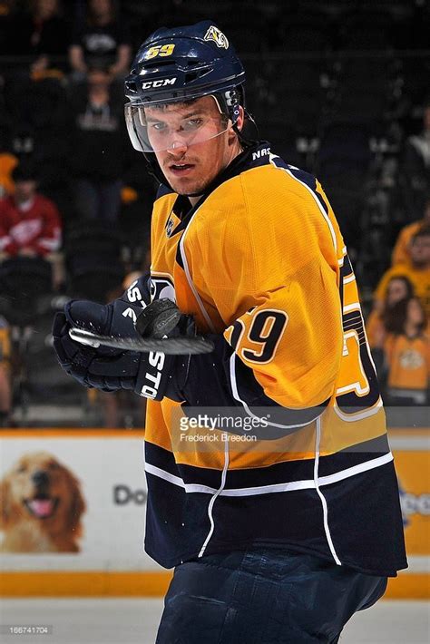 Roman Josi of the Nashville Predators throws a puck in the air during ...