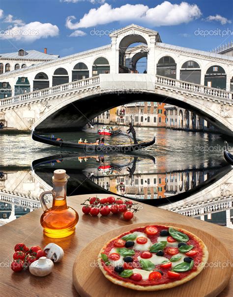 Classic Italian pizza in Venice against canal, Italy — Stock Photo © samot #30484723