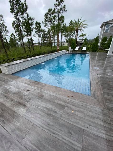 Porcelain pavers pool deck | Pool deck tile, Pool pavers, Outdoor pool area