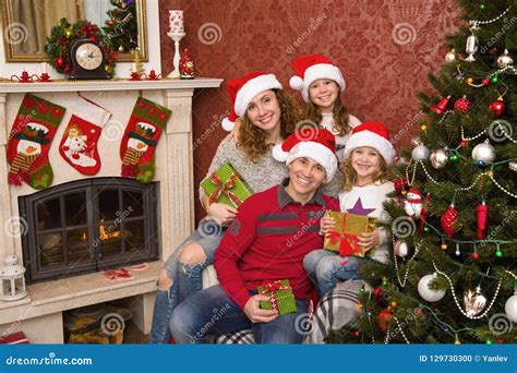 Family in christmas day stock photo. Image of christmas - 129730300