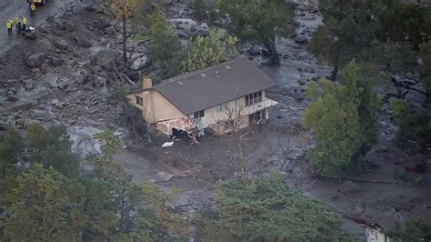 California mudslides kill 13 people as search for survivors continues