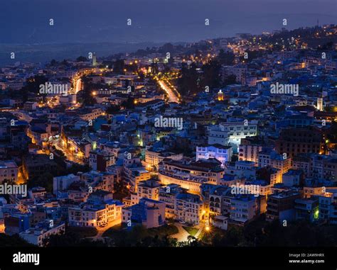 CHEFCHAOUEN, MOROCCO - CIRCA MAY 2018: Panoramic view of Chefchaouen and the Rif mountains at ...