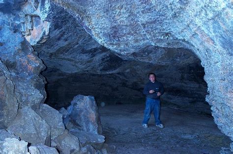 Craters of the Moon - Matt exploring inside a lava tube | Craters of ...