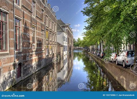 Delft Canal stock photo. Image of windows, homes, water - 15373086