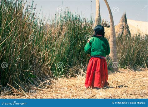 UROS ISLAND - LAKE TITICACA - PERU, January, 3, 2007: Unidentified Uros Woman With Crafts In ...