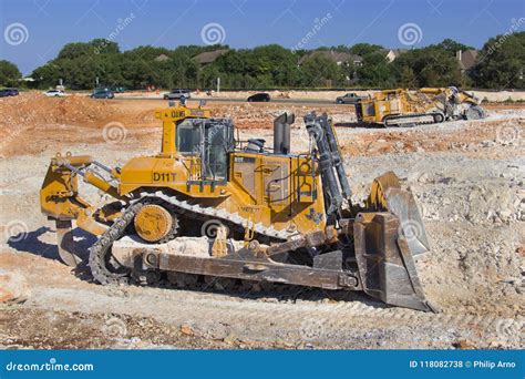 Two Very Large Road Building Machines Leveling the Ground Editorial ...