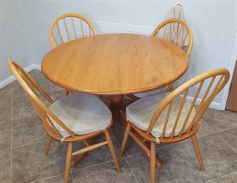 Ercol round table with 4 matching Windsor chairs. Good condition. | in ...