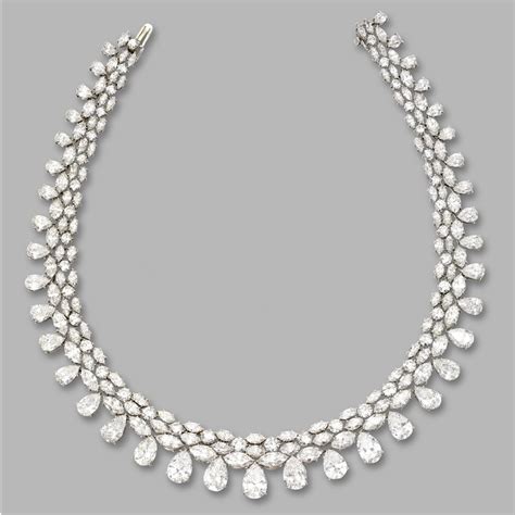 DIAMOND NECKLACE. Pear-shaped, round and marquise-shaped diamonds ...