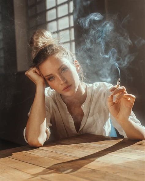 Carolina Porqueddu smoking at table in window light | 2019-10-20 People ...