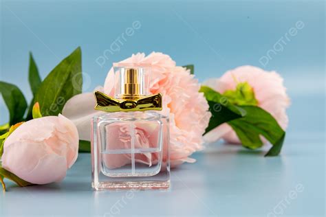 Perfume Pink Flowers Blue Background And Picture For Free Download - Pngtree