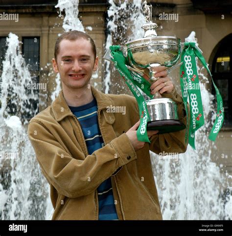 World Snooker champion Graeme Dott poses for photographers with the ...