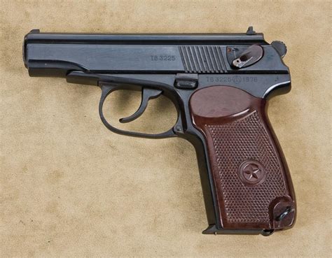 Soviet military Makarov semi-auto pistol, 9mm cal., 4” barrel, blue finish, checkered maroon plastic