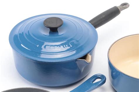 Le Creuset Cast Iron Enamel Pots and Pans with Stoneware Ramekins | EBTH