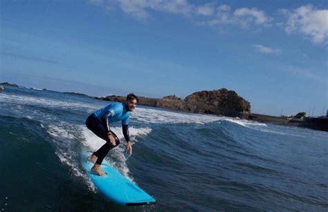 Beginner and intermediate surfing lessons in Puerto de la Cruz, Tenerife