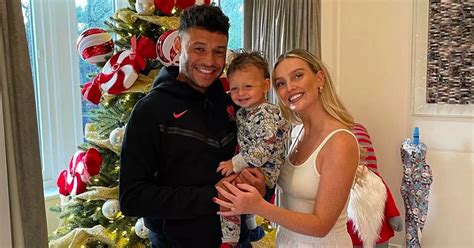 Perrie Edwards enjoys cosy Christmas with fiancé Alex and adorable baby ...