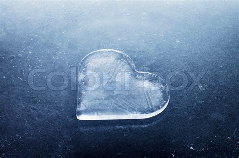 A Heart-shaped piece of ice on ice ... | Stock image | Colourbox