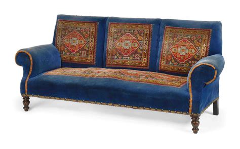 A LATE VICTORIAN BLUE VELVET UPHOLSTERED SOFA , CIRCA 1900 | Christie's