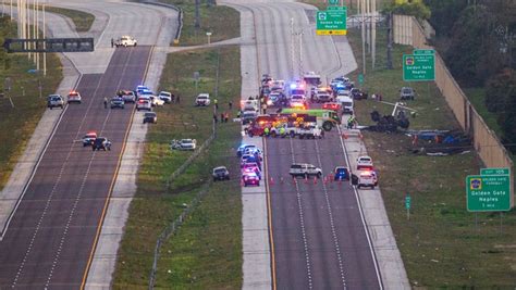 Photos show site of fiery plane crash on I-75 near Naples, Florida