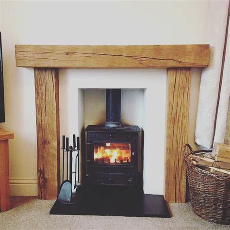 Traditional solid oak beam fire surround in 2020 | Wooden fireplace surround, Wooden fire ...