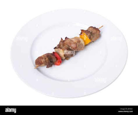 Shish kebab with vegetables. Isolated on a white background Stock Photo ...