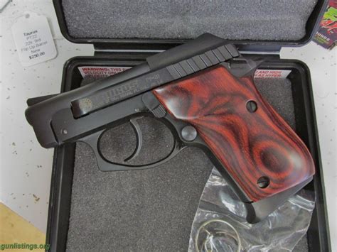 Gunlistings.org - Pistols Taurus PT22, 22 Lr, 2.75" 8+1 Rosewood Grip NEW