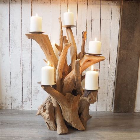 This stunning driftwood effect candelabra. Rustic teak root creates this unique candle holder ...