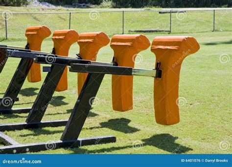 Orange Tackling Dummies stock photo. Image of game, dummy - 6401076